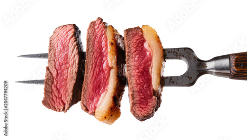 Three juicy rare steak slices on a metal fork, isolated on transparent background