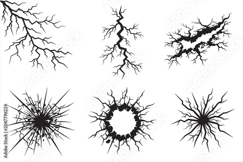 Set of black cracked surface textures and shattered impact patterns for design