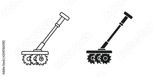 Foto Garden tool for lawn care with rotating blades during summer day for home improv