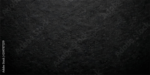 Foto A stark, textured black background that evokes mystery and depth.