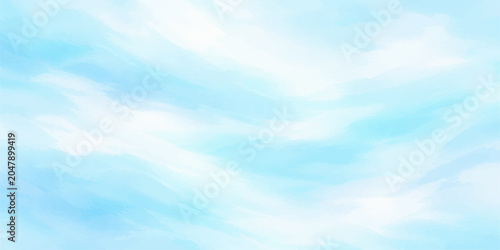 Fotografia Soft, ethereal clouds drift across a vibrant, clear blue sky, creating a serene and tranquil backdrop