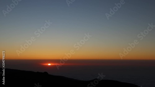 Sunset horizon and cloud inversion in Teide National Park