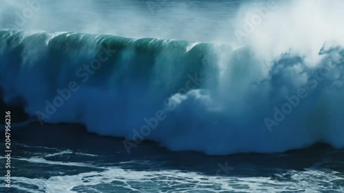 Epic ocean wave crashing with sea spray and turbulent water movement creating a powerful seascape