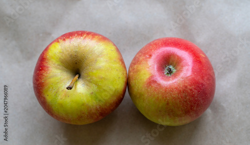 Two Fresh Red Green Apples Top View On Brown Paper Background For Healthy Snack Or Recipe