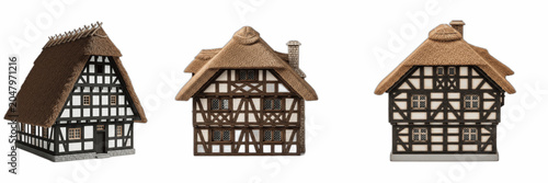 Foto Isolated set of traditional European half timbered cottage houses with thatched