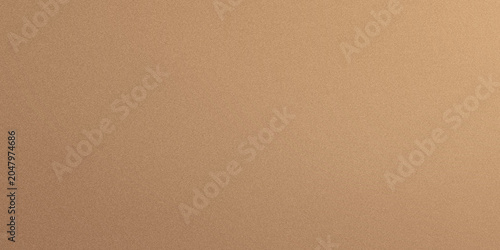 A high resolution close up shot of a smooth brown paper texture featuring a subtle matte finish