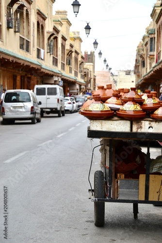 Street seller with tagines in Marrakech, Morocco