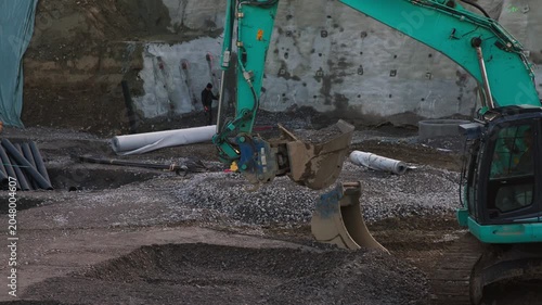 Excavator Bucket Working in Active Construction Excavation Site 2