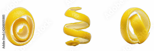 Foto Isolated set of twisted organic yellow lemon zests and fresh citrus rind spirals