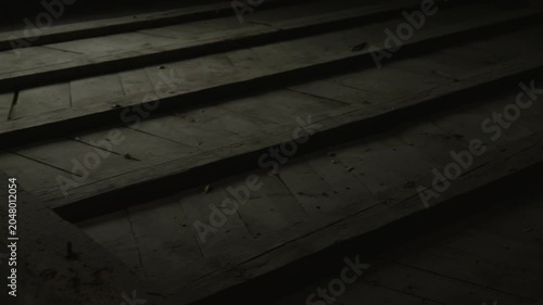 Dark Wooden Attic Floorboards in Low Light