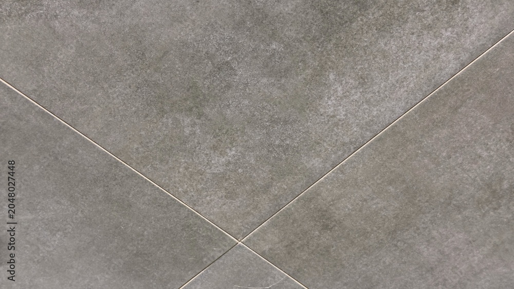 Fototapeta premium Olive grey concrete tile texture background with geometric diagonal grout lines and matte stone surface