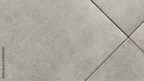 Bild auf Leinwand Minimalist light grey stone tile texture background with diagonal grout lines an