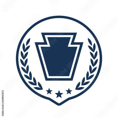 Keystone shield logo inside a navy blue laurel wreath.