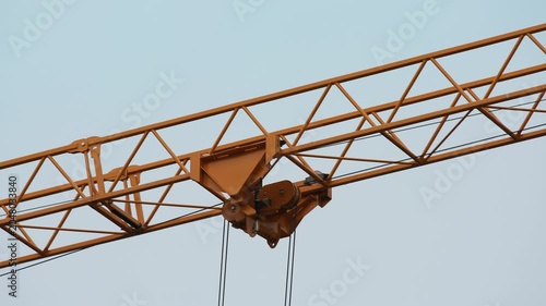 Tower Crane Trolley Moving Along Crane Jib at Construction Site