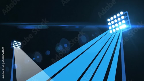 Two stadium floodlights shining bright white beams against a pitch black night sky background, sports arena concept