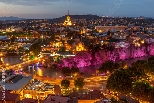South Caucasus, Republic of Georgia, Tbilisi. City overview, skyline. Sunset.