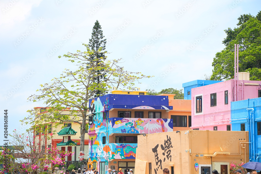 Fototapeta premium Colorful Village Houses on Ma Wan Island, Hong Kong Chinese characters: Ma Wan Island