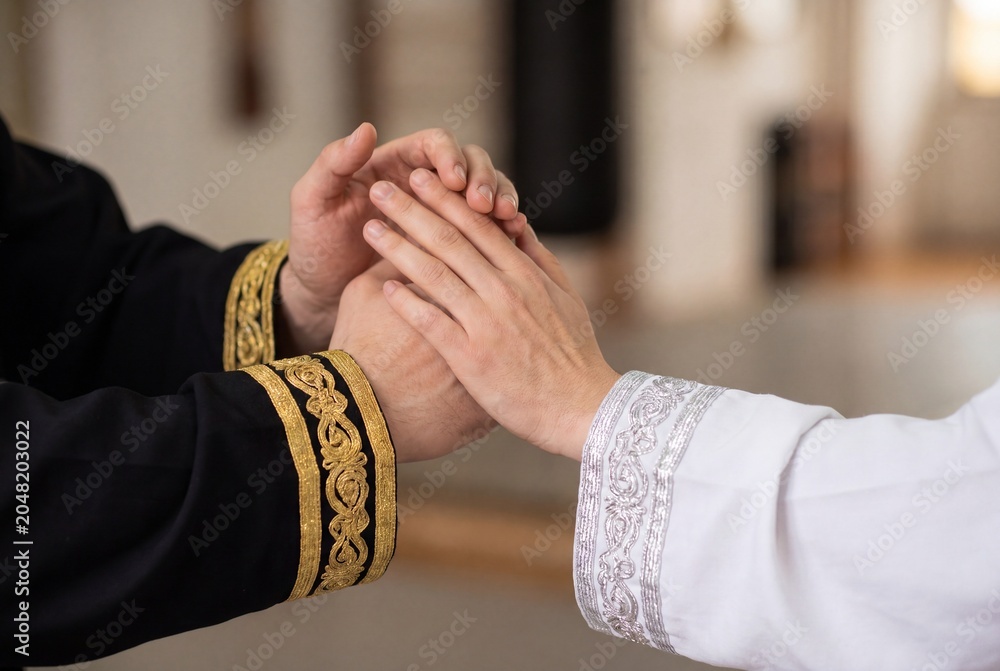 Fototapeta premium Close up View of Martial Arts Practitioners Hands during Push Hands Exercise