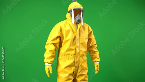 Professional Hazmat Suit Against Green Screen Background for Healthcare and Environmental Safety Concepts