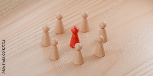 3d wooden pawn figurines with one highlighted in red, criticism, social state of mind