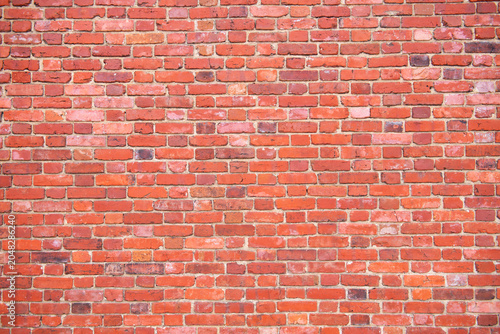 Foto Antique bricks wall background, red brick masonry surface
