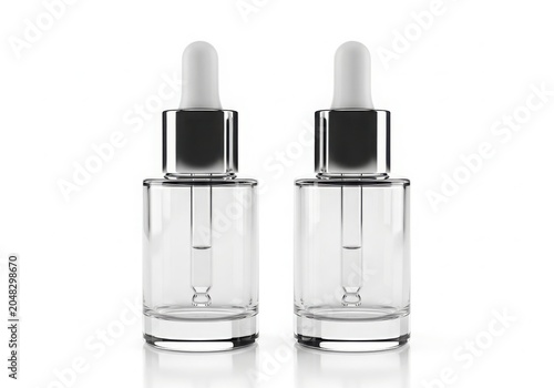 Two identical glass perfume dropper bottles