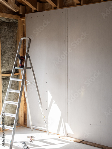 plasterboard on a wooden structure and mineral wool insulation