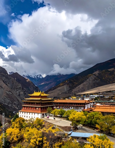 A serene monastery nestled in a valley surrounded by mountains