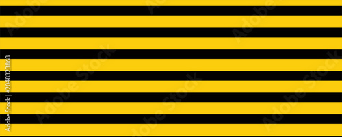 Warning tape with yellow and black diagonal stripes. Warn stop seamless line. Yellow and black caution tape border.