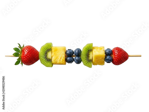 Fresh fruit skewer with strawberry kiwi pineapple and blueberry on a stick during daylight