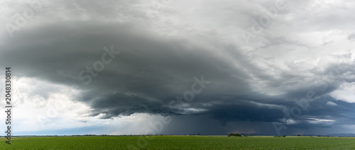 Obraz na płótnie Powerful storm clouds gathering over Bavaria Germany panoramic view of threateni