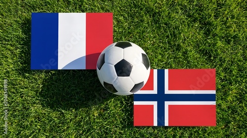 Soccer Ball with France vs Norway Flags on Green Grass Field for Football Championship, Group I, 30 June 2026