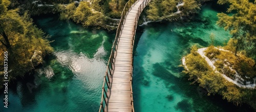 Scenic Wooden Footbridge Over Turquoise Lake