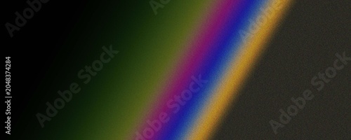 Fotografie Abstract light diffraction effect showing rainbow color spectrum on dark surface