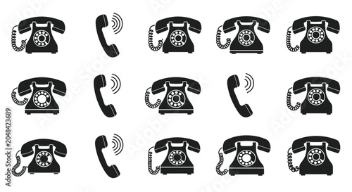 Fotografija Black rotary phones and handsets.