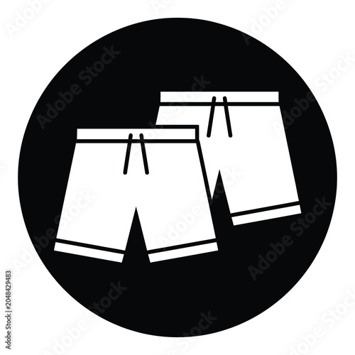 Vászonkép Two white shorts with drawstring waistbands and cuffs on circular black backgrou