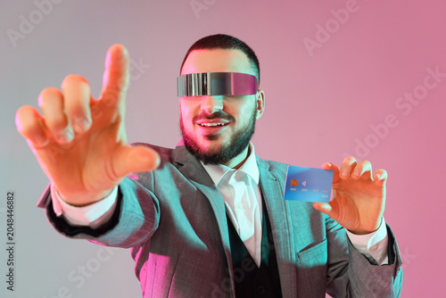 Young businessman in AR gla...