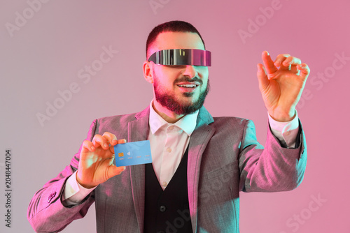 Young businessman in AR gla...
