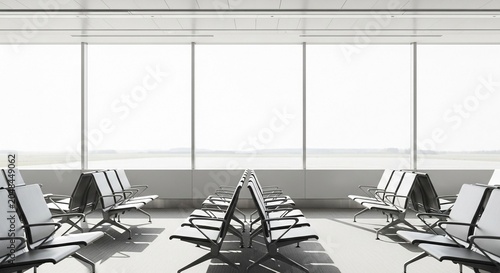 Modern airport waiting lounge with rows of empty seats illuminated by large windows