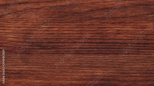 Natural mahogany wood grain texture with rich brown horizontal pattern surface