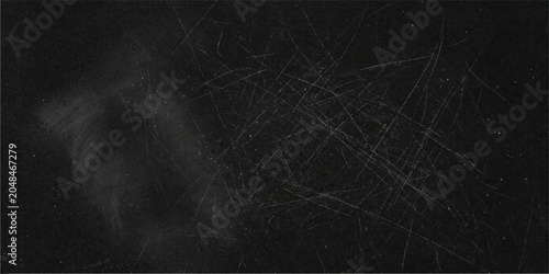Bild auf Leinwand A dark, textured blackboard surface is covered in faint chalk dust and numerous scratches, suggesting past use and the residue of lessons learned