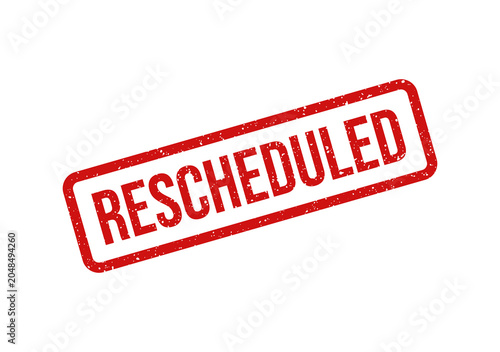 Red rescheduled rubber stamp with bold text