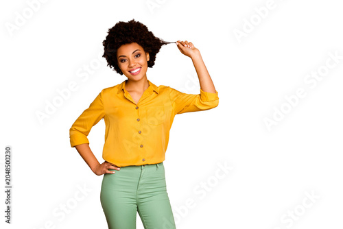 Valokuva Photo of charming beautiful dark skin lady holding wavy curl showing nice result
