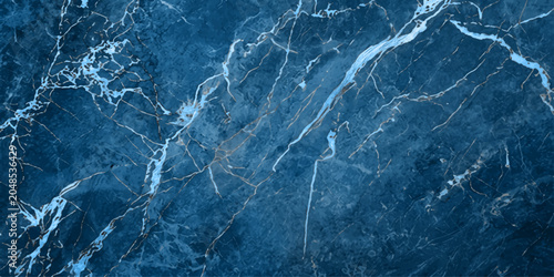 Photography Deep blue marble texture with intricate white veins creating a sophisticated and luxurious abstract background, suitable for design and artistic applications