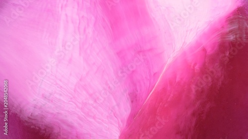 Obraz na płótnie Exploring bright colors with alcohol ink in abstract video art on a blank canvas