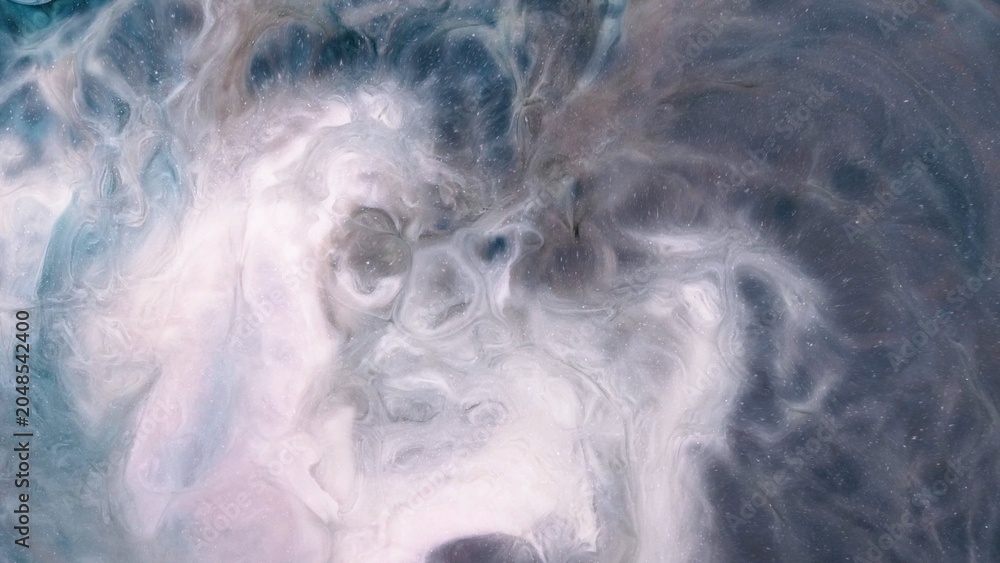 Obraz premium Creative exploration of alcohol ink in abstract video art with swirling patterns and colors