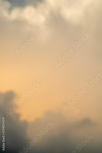Soft hues of dusk enveloped in gentle clouds during twilight.