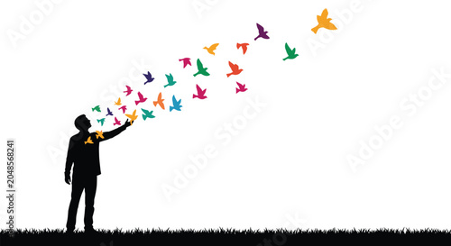 Silhouette of a man releasing a flock of colorful birds into the sky representing freedom, creativity, and new ideas on white background.