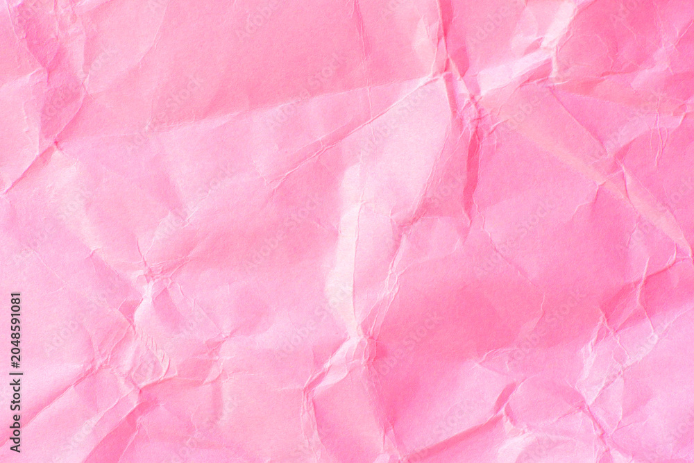 Fototapeta premium Pink crumpled paper texture background 