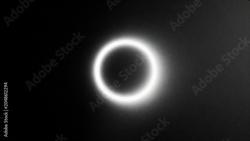 Soft circular luminous ring featuring analog grain texture and smooth blur effects